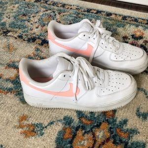 Nike Air Force 1 with pink/peach swoosh